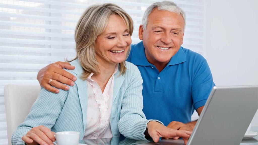older couple looking at computer